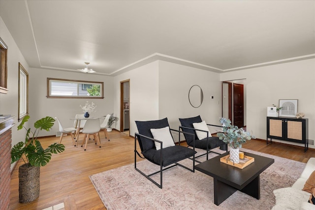 4218 N E St, Spokane, WA 99205 - living room featuring light wood-style floors and baseboards