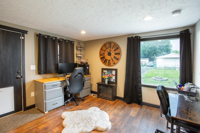 1207 E Bismark Ave, Spokane, WA 99208 - office space featuring hardwood / wood-style floors, a textured ceiling, baseboards, and recessed lighting