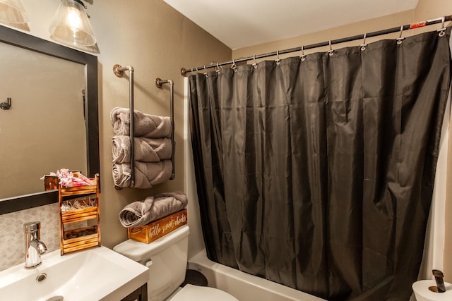 1207 E Bismark Ave, Spokane, WA 99208 - bathroom with toilet, vanity, and shower / bathtub combination with curtain
