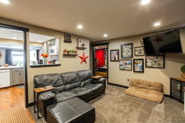 1207 E Bismark Ave, Spokane, WA 99208 - living room with recessed lighting, baseboards, and light colored carpet