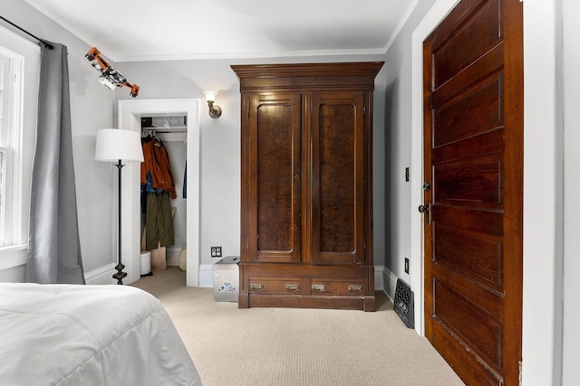 1732 W 14th Ave, Spokane, WA 99204 - carpeted bedroom featuring crown molding and a closet