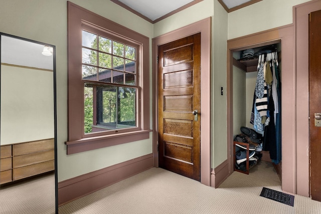 1732 W 14th Ave, Spokane, WA 99204 - carpeted entrance foyer featuring crown molding and baseboards