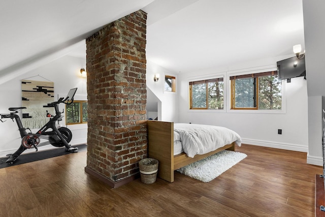 1732 W 14th Ave, Spokane, WA 99204 - bedroom with wood finished floors, lofted ceiling, and baseboards