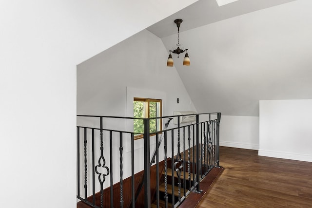 1732 W 14th Ave, Spokane, WA 99204 - stairs with a chandelier, vaulted ceiling, wood finished floors, and baseboards