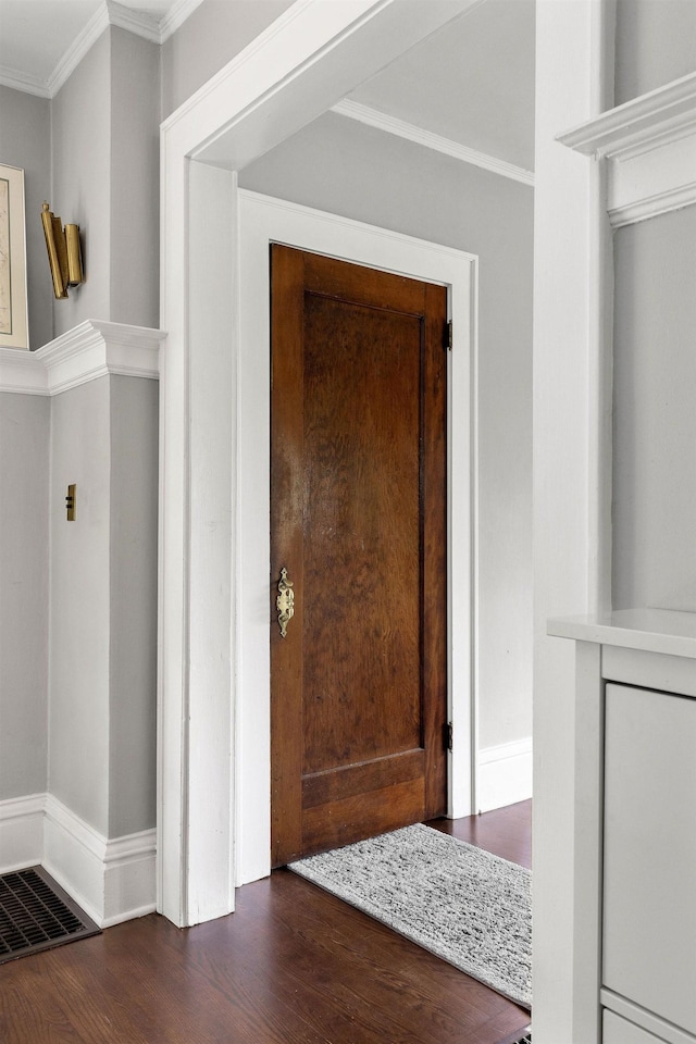 1732 W 14th Ave, Spokane, WA 99204 - entryway featuring dark wood-style flooring, crown molding, and baseboards