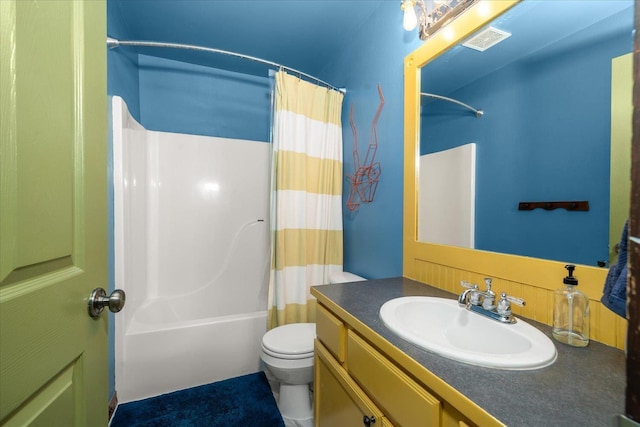 2215 N 8th St, Cheney, WA 99004 - bathroom featuring vanity, shower / bath combo, and toilet