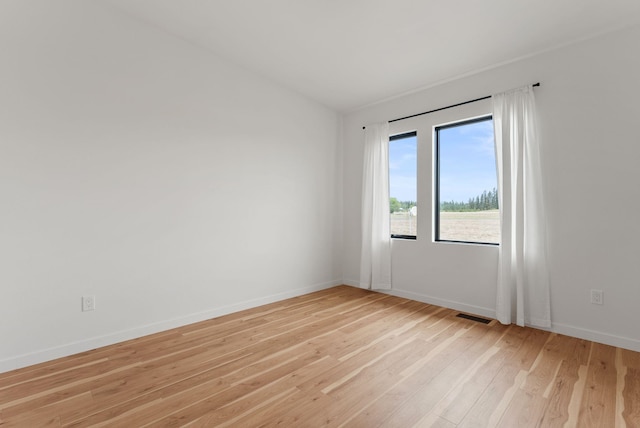 311 N Christensen Rd, Medical Lake, WA 99022 - empty room with light wood-type flooring and baseboards