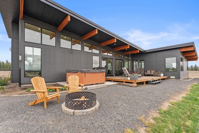 311 N Christensen Rd, Medical Lake, WA 99022 - view of patio with a hot tub, a fire pit, and a wooden deck