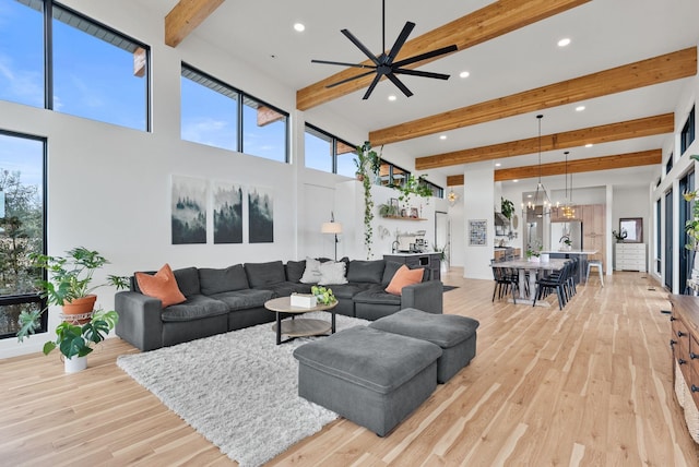 311 N Christensen Rd, Medical Lake, WA 99022 - living area featuring beamed ceiling, light wood-type flooring, recessed lighting, healthy amount of natural light, and ceiling fan