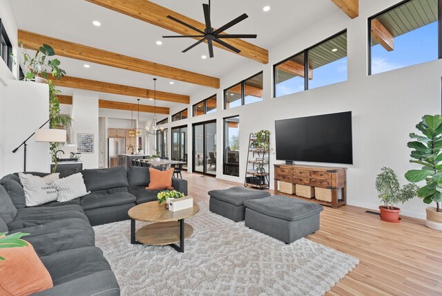 311 N Christensen Rd, Medical Lake, WA 99022 - living area featuring beamed ceiling, light wood-style floors, recessed lighting, ceiling fan, and baseboards