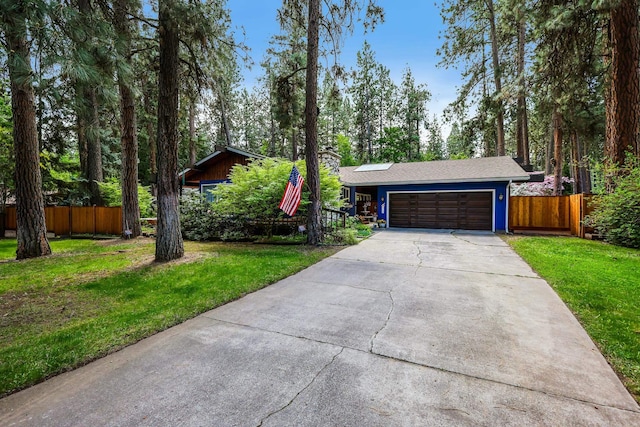 10808 47th Ave, Spokane Valley, WA 99206 - view of front of home with a garage, driveway, and a chimney