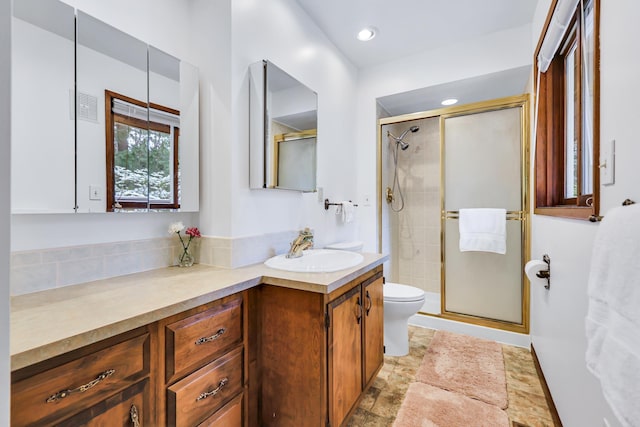 10808 47th Ave, Spokane Valley, WA 99206 - full bathroom featuring toilet, vanity, a stall shower, and recessed lighting