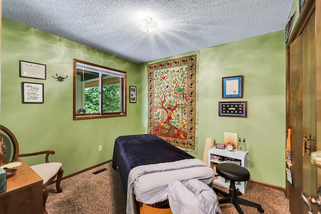 10808 47th Ave, Spokane Valley, WA 99206 - carpeted bedroom featuring a textured ceiling and baseboards