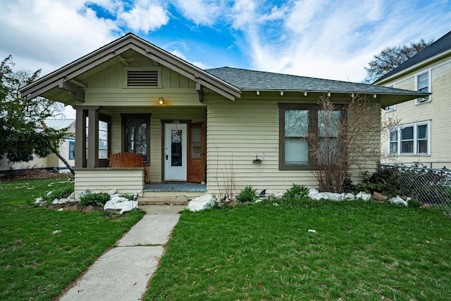 216 6th St, Cheney, WA 99004 - view of front of house featuring covered porch, roof with shingles, and board and batten siding