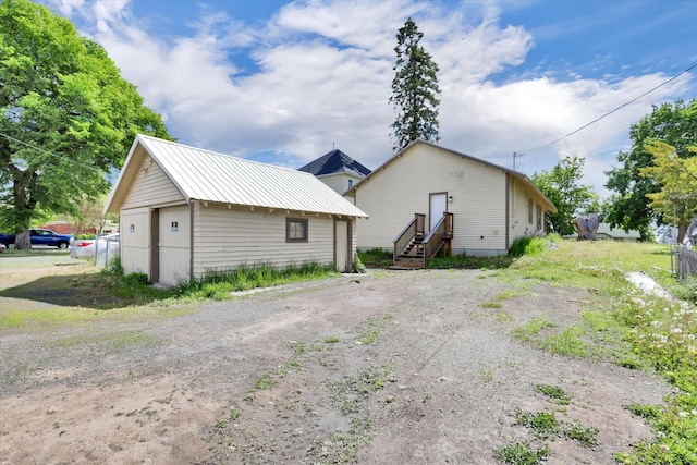 216 6th St, Cheney, WA 99004 - exterior space with an outdoor structure and metal roof