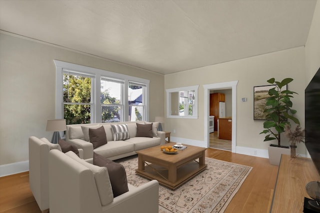 216 6th St, Cheney, WA 99004 - living area featuring baseboards and light wood-type flooring
