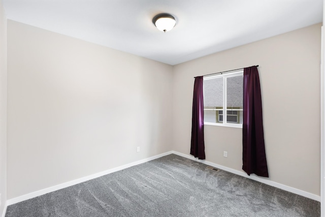 723 S Hatch St, Spokane, WA 99202 - carpeted empty room featuring baseboards