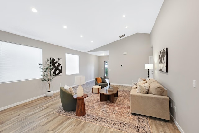 723 S Hatch St, Spokane, WA 99202 - living room with light wood finished floors, recessed lighting, vaulted ceiling, and baseboards