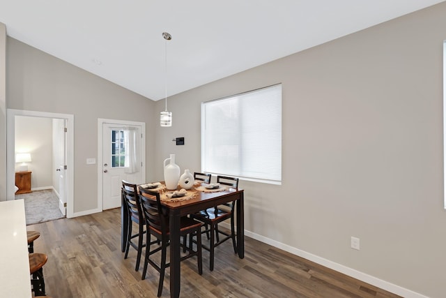 723 S Hatch St, Spokane, WA 99202 - dining room with baseboards, wood finished floors, and lofted ceiling