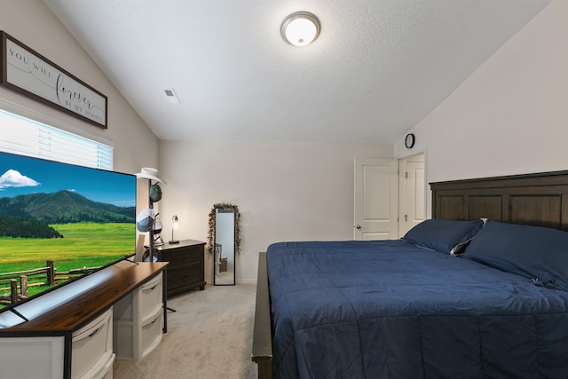 8604 W 8th Ave, Spokane, WA 99224 - bedroom featuring light colored carpet and lofted ceiling