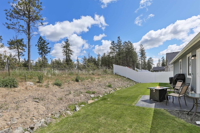 8604 W 8th Ave, Spokane, WA 99224 - view of yard with an outdoor fire pit and a patio area