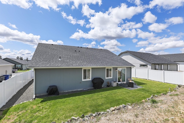 8604 W 8th Ave, Spokane, WA 99224 - back of property with roof with shingles and a patio