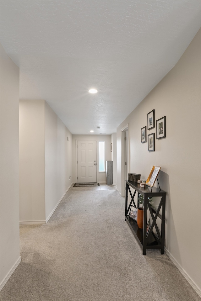 8604 W 8th Ave, Spokane, WA 99224 - hall featuring light carpet, baseboards, and recessed lighting