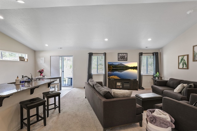 8604 W 8th Ave, Spokane, WA 99224 - living area with lofted ceiling, light colored carpet, and recessed lighting