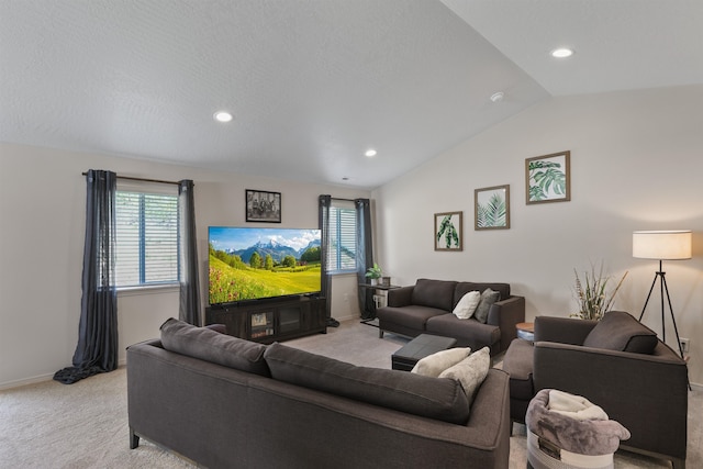 8604 W 8th Ave, Spokane, WA 99224 - living room with light carpet, vaulted ceiling, baseboards, and recessed lighting