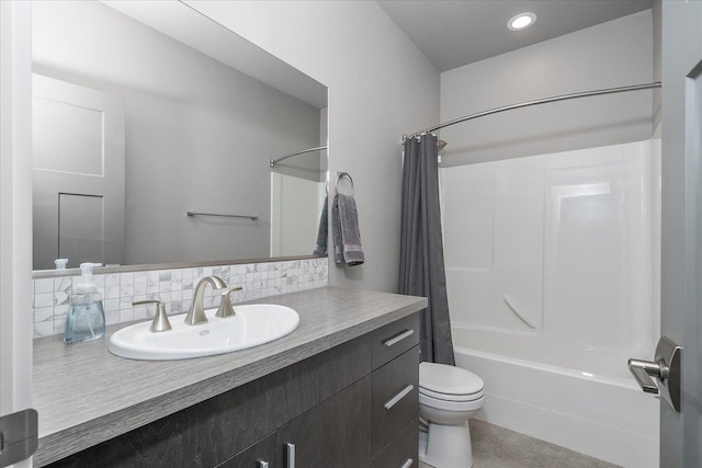 24481 E Pinnacle Ct Unit D, Liberty Lake, WA 99019 - full bath featuring vanity, shower / bath combo, toilet, and backsplash