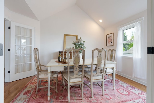 8904 E Boardwalk Ln, Spokane, WA 99212 - dining room with vaulted ceiling, wood finished floors, and recessed lighting