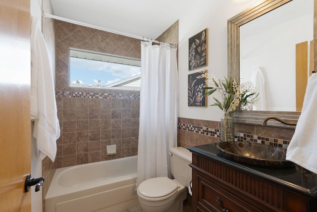 8904 E Boardwalk Ln, Spokane, WA 99212 - full bath with vanity, shower / bath combo with shower curtain, and tile walls