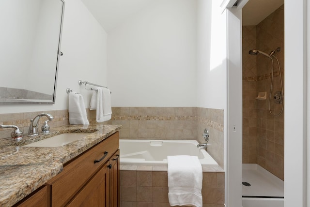 8904 E Boardwalk Ln, Spokane, WA 99212 - full bath with a garden tub, vanity, and a stall shower