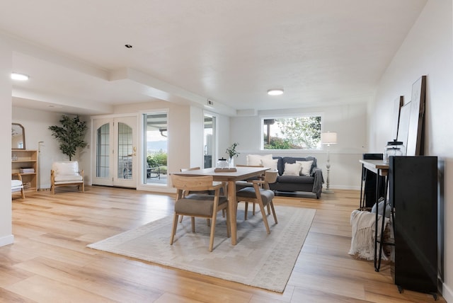8904 E Boardwalk Ln, Spokane, WA 99212 - dining room featuring light wood finished floors and baseboards