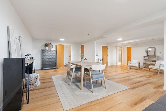 8904 E Boardwalk Ln, Spokane, WA 99212 - dining space with light wood-style flooring and recessed lighting