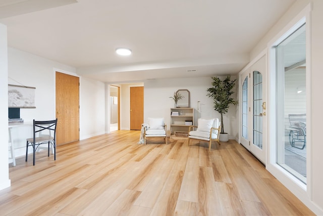 8904 E Boardwalk Ln, Spokane, WA 99212 - sitting room featuring light wood-style flooring and baseboards