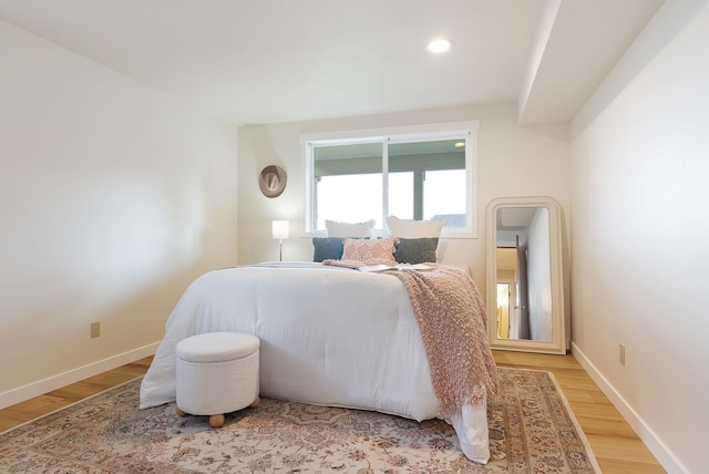 8904 E Boardwalk Ln, Spokane, WA 99212 - bedroom with light wood-style flooring and recessed lighting