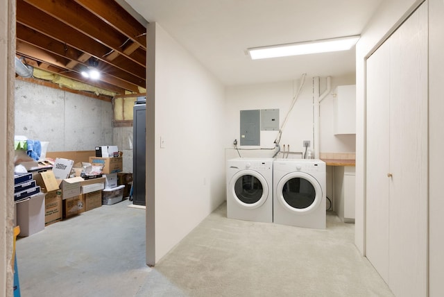 8904 E Boardwalk Ln, Spokane, WA 99212 - laundry area with independent washer and dryer, electric panel, and cabinet space