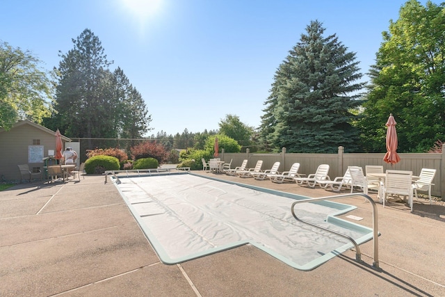 8904 E Boardwalk Ln, Spokane, WA 99212 - view of pool featuring a patio and view of scattered trees