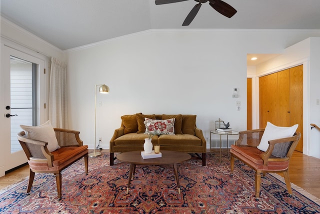 8904 E Boardwalk Ln, Spokane, WA 99212 - living area featuring lofted ceiling, ornamental molding, a ceiling fan, and wood finished floors