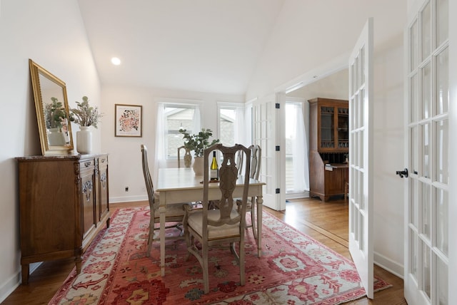 8904 E Boardwalk Ln, Spokane, WA 99212 - dining space with french doors, lofted ceiling, light wood-style flooring, and recessed lighting