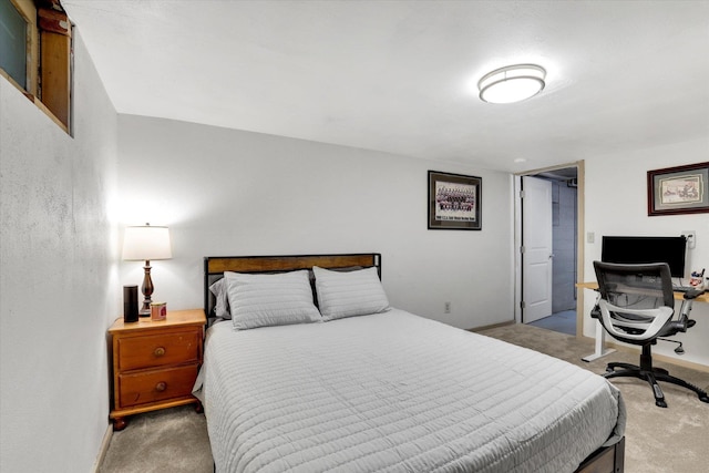 1419 E Glass Ave, Spokane, WA 99207 - bedroom with light colored carpet, baseboards, and an office area