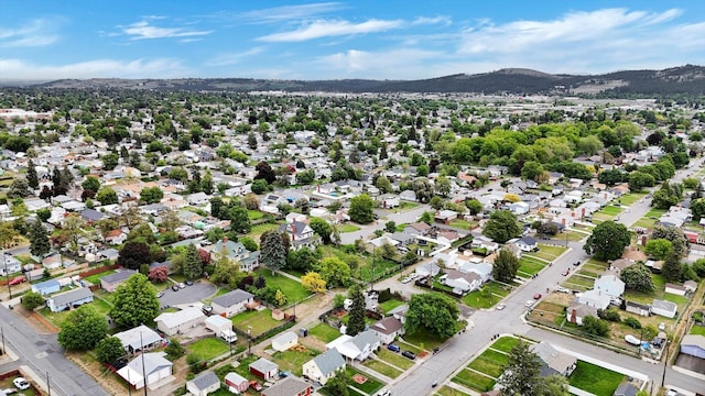 1419 E Glass Ave, Spokane, WA 99207 - aerial view of property and surrounding area with a mountain backdrop