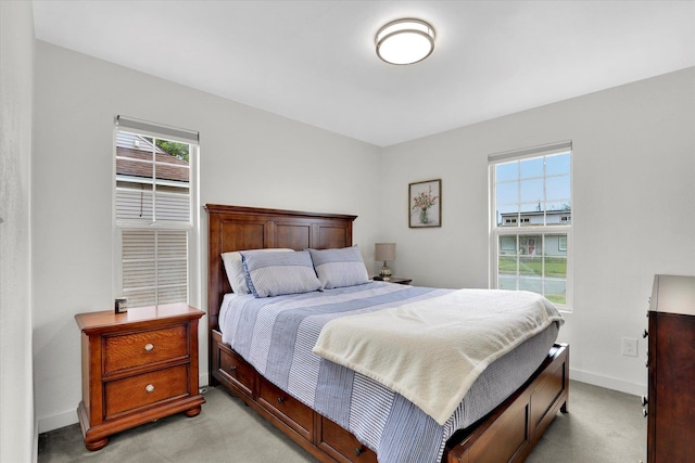 1419 E Glass Ave, Spokane, WA 99207 - bedroom with light carpet and baseboards