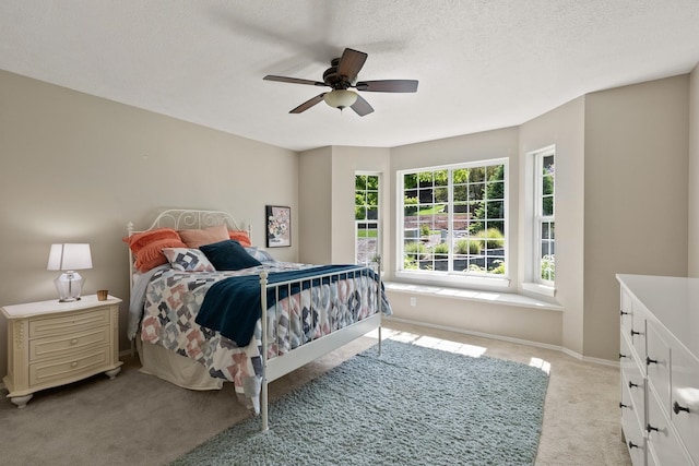 14716 E 48th Ln, Veradale, WA 99037 - bedroom with carpet flooring, baseboards, a ceiling fan, and a textured ceiling