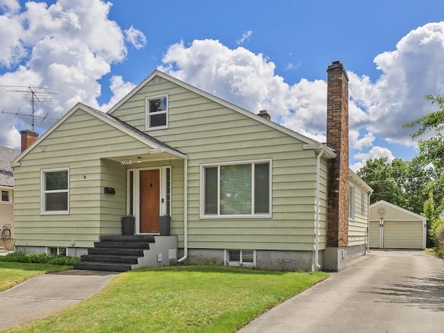 4008 E 5th Ave, Spokane, WA 99202 - bungalow-style house with a chimney, a front yard, a detached garage, an outbuilding, and entry steps