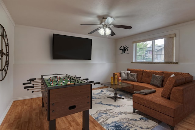 11920 E Railroad Ave, Spokane, WA 99206 - living room featuring wood finished floors, a ceiling fan, ornamental molding, and baseboards