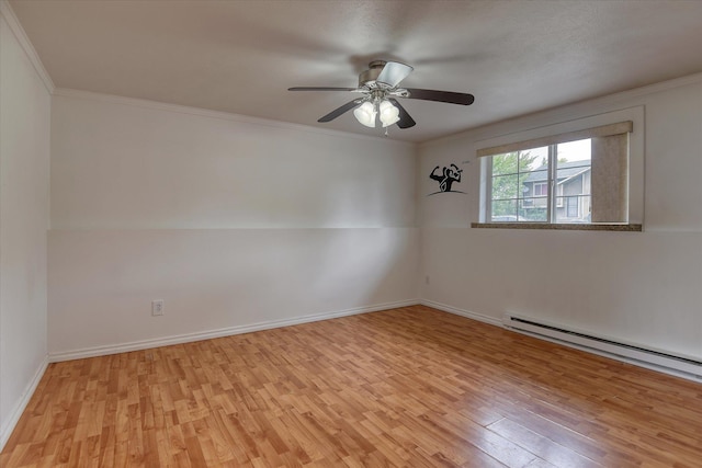 11920 E Railroad Ave, Spokane, WA 99206 - unfurnished room featuring a baseboard heating unit, light wood-style floors, crown molding, baseboards, and a ceiling fan
