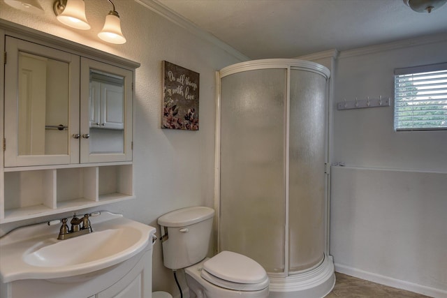 11920 E Railroad Ave, Spokane, WA 99206 - bathroom with a stall shower, vanity, toilet, crown molding, and baseboards