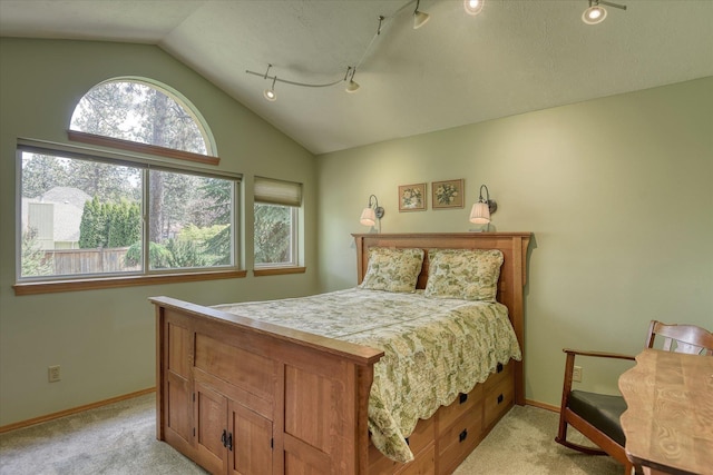 4307 S Apollo St, Spokane, WA 99223 - bedroom featuring lofted ceiling, light colored carpet, and baseboards